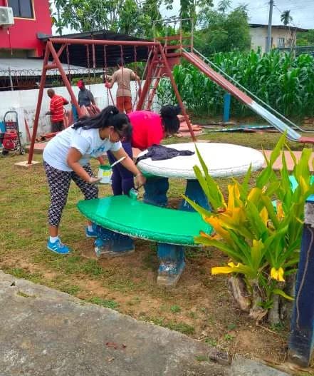 WISH volunteers restoring the children’s play park