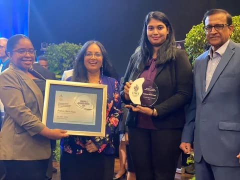 WISH's executive team receiving recognition at UWI